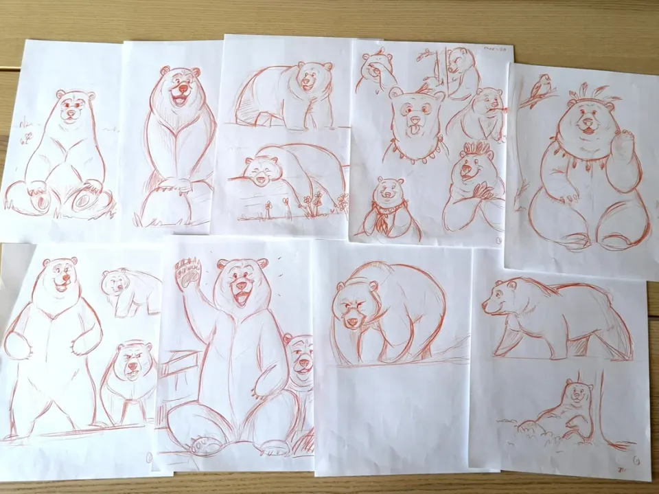 Neuf feuilles de recherches d’ours au crayon rouge